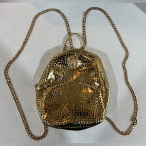 Laurel Dewitt Metallic Gold Chain Backpack